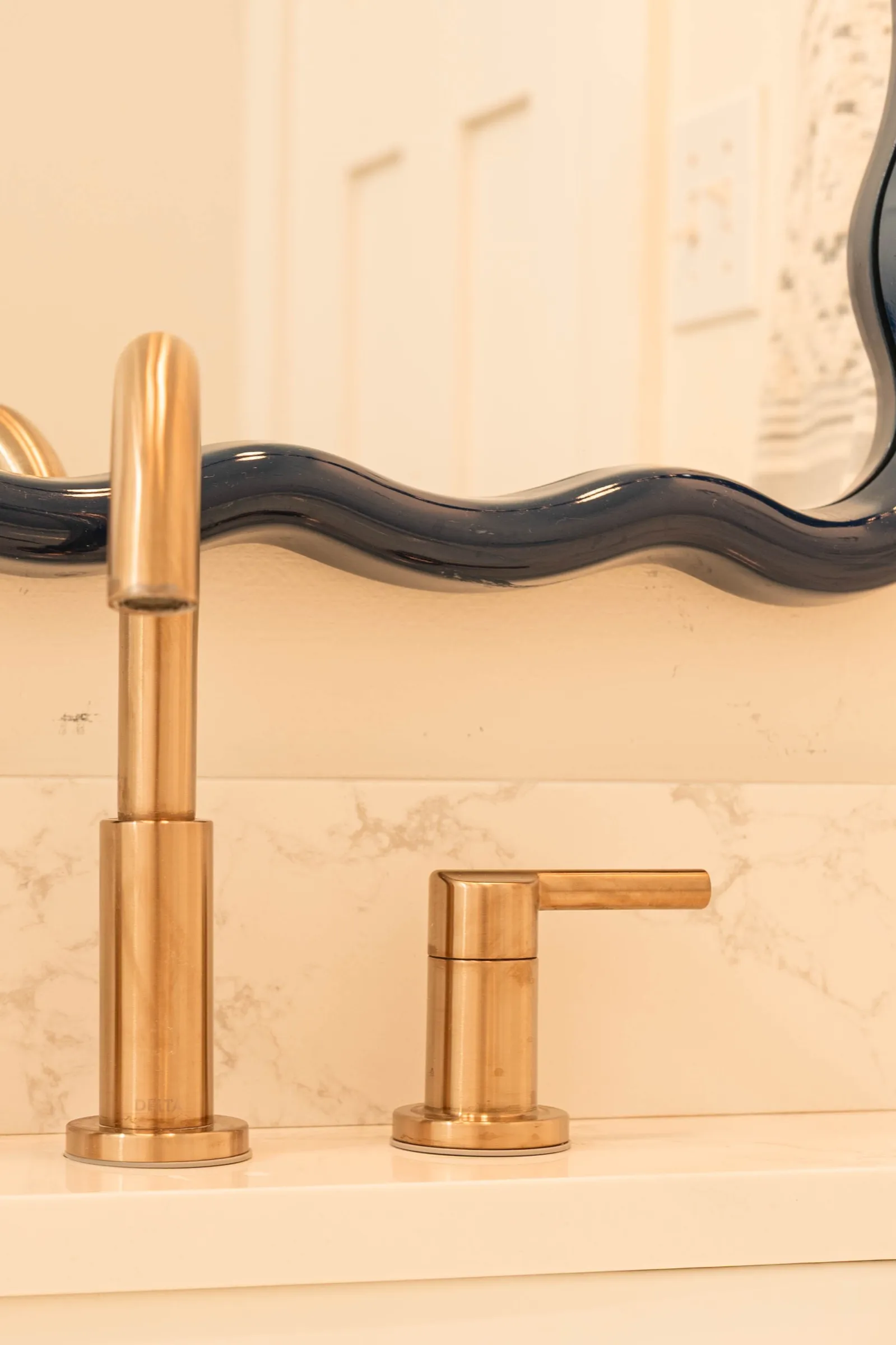 Teak stool set inside the white-tiled shower